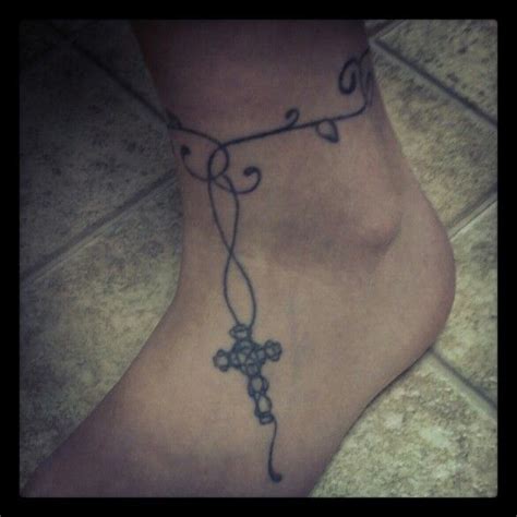 Cross tattoo represents different things to people. My second tattoo, 2008. Inspiration from a cross necklace ...