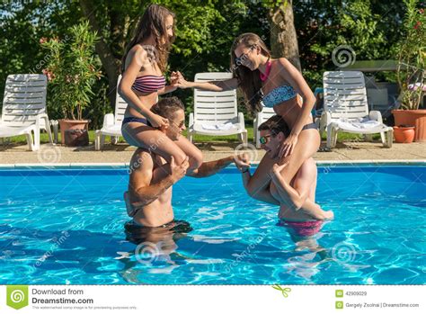 Explore millions of awesome videos and pictures in an endless random gallery on scrolller.com. Four Friends Having Fun In The Swimming Pool Stock Image ...