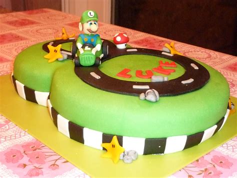 Mario brothers 23 piece birthday cake topper set featuring mario castle, bomb, mario coins, 6 mario figures including mario, luigi, princess peach, toad, yoshi, donkey kong, and 12 mario 1 decorative buttons. Luigi cake for Luke 8 years | Luigi cake, Party cakes, Cake