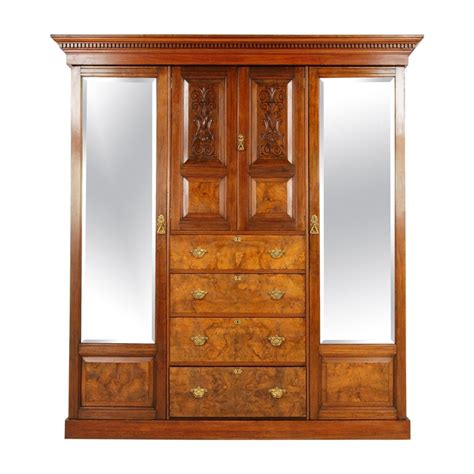 The perfect solution is a wardrobe closet from totally furniture. Antique Walnut Armoire Carved 3 Door Compaction Wardrobe ...