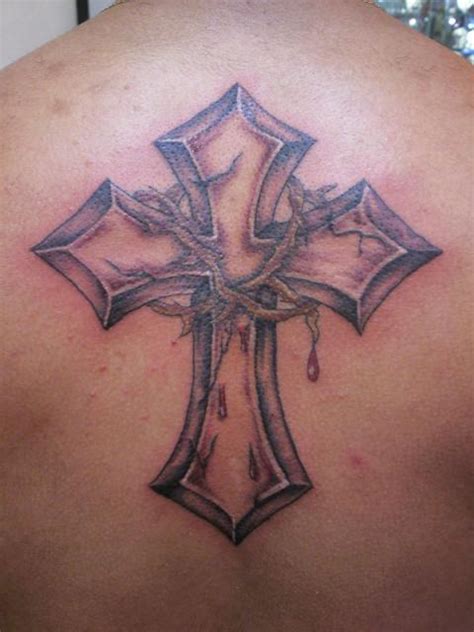 Crucifix cross tattoo on back. Crown of Thorns Tattoos Designs, Ideas and Meaning ...