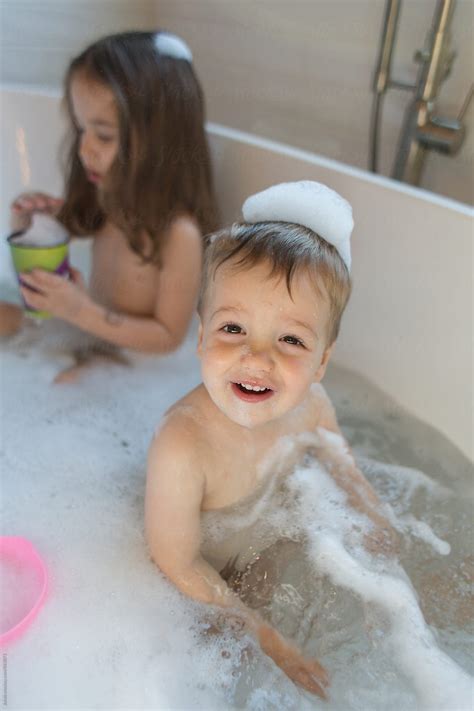 This is the only authorized. Cute boy toddler playing in a bathtub by Jakob Lagerstedt ...