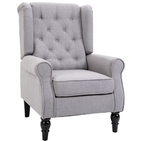 With its curved arms, piping detailing and fashionably splayed wooden legs in dark wood, it looks beautiful in many styles of home. HOMCOM Fabric Tufted Accent Armchair Grey | Aosom UK