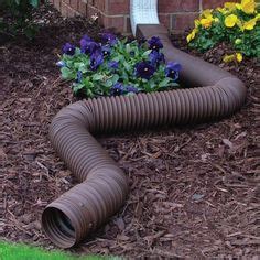 Burying gutter downspouts is a great way to protect your home and yard from water damage. Flex-A-Spout™ Downspout Diverter | Home Improvement ...