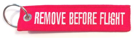 Of the many awesome wes anderson and bike related products here, the 'remove before flight' tag just steals it. Nyckelring Remove before flight