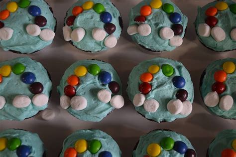 These double rainbow cupcakes look absolutely amazing and are easier than. Rainbow cupcakes - skittles and mini marshmallows on sky ...