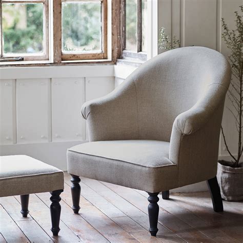 Lantana arm chair in linen cream fabric and gray rustic finish our lantana armchair will create a sophisticated style, premium comfort, and lasting beauty in every home. Clandon Linen Armchair By Rowen & Wren ...