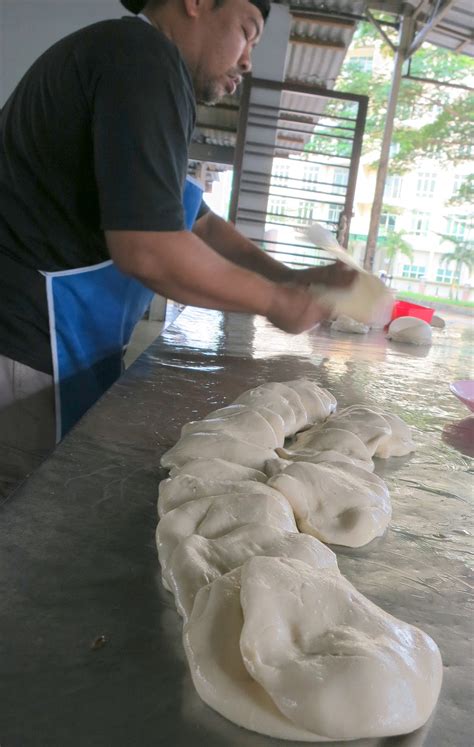 Roti canai is a type of flatbread that often can be seen in mamak stalls in malaysia. Breakfast at Roti Canai (Prata) Bukit Chagar. Gerai MFR in ...