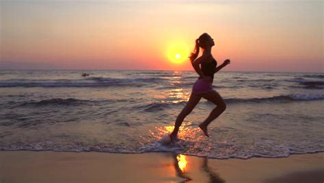 Maybe you would like to learn more about one of these? HD 1080i: Businessman Man Doing Yoga On A Beach At Sunrise ...