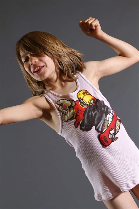 He hugs his skate in the photos. TBM Robbie Cole Sprouse T-Shirt - Face Boy