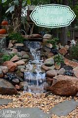 Learn how to install a water feature, it's not as hard as it looks. Pondless Waterfall - All Things Heart and Home | Outdoor water features, Waterfalls backyard ...