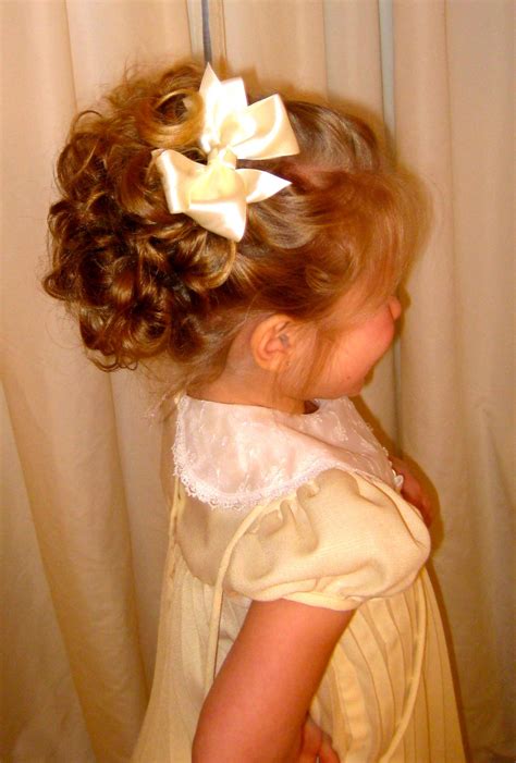 Simply put your girls' hair in a ponytail, then wrapped the remaining hair around the elastic. Cute Easter Hairstyle! #hair #easterstyle; yup like this only instead of a bow it would be a ...