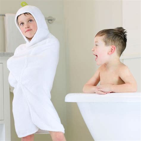 I sometimes shower with him, but he loves having an actual bath and splashing around. Puj Big Hug Fitted Toddler Bath Towel - White | Toddler ...