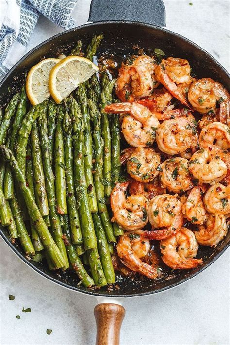 Season with salt (to taste). Garlic Butter Shrimp with Asparagus - So much flavor and ...