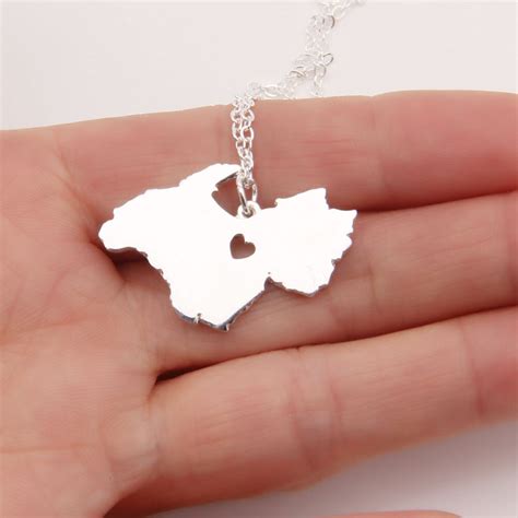 An engraved pendant necklace, because who carries photos in their wallet anymore? Cute New Westie Necklace Pendant Puppy Heart Dog Lover ...