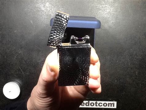 This lighter starts fires with electricity alone!: Disassembly and schematic of an arc lighter. - YouTube