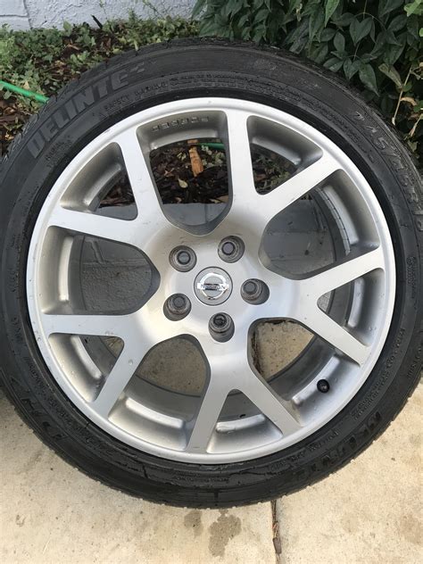 The tire size which works best on both axels is 215/45, but based on the body size of the 98 altima, you might want to go yes they will fit fine i have a salvage 2009 nissan altima i put 22 inch rims and no promblem. 2005 Nissan Altima SE R OEM Rims with Delinte 245/45R 18 ...