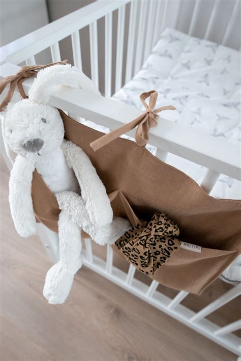 Designing a bathroom specifically for your child is different than perfecting a master bathroom space for yourself. Box organiser in earth colours Scandinavian baby crib ...