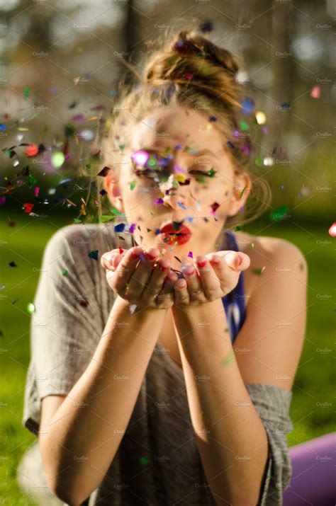 Girl Blowing Glitter | High-Quality People Images ~ Creative Market