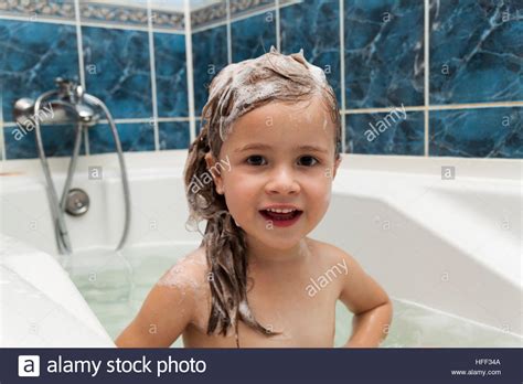 Blonde cutie pleases her hairy pussy. Cute little girl washes her hair. Clean kid after shower ...