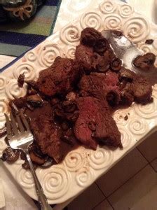 Stir in wine, worcestershire sauce, and thyme. Beef Tenderloin with Port Mushroom Sauce - New Year's Day ...