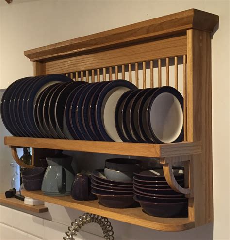 A budget friendly way to add sturdy and functional storage shelves to the main focus for this week was clearing out the clutter and installing some more storage. PINE PAINTED OAK PLATE RACK