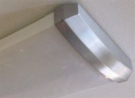Step by step guide for removing fluorescent light fixture. Difficult fluorescent light fixture lens removal ...