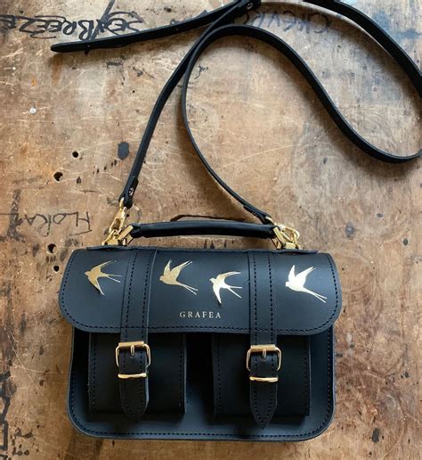 This information applies only to the desktop, console, and mobile versions of terraria. Black and gold leather satchel by Grafea- Swallow Birds Pattern #grafea #gold #swallow # ...