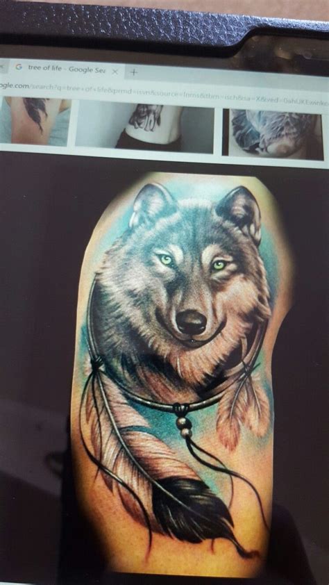 Dreamcatcher wolf head tattoo design. Dreamcatcher wolf | Native tattoos, Feather tattoo design ...