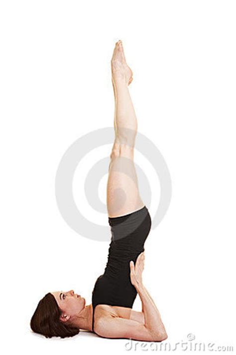 Let the left arm hang down. Flexible Woman Doing Shoulder Stand Stock Photos - Image: 19479693