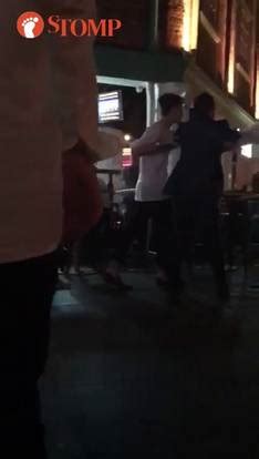 Ensuring that clarke quay gets its fill of guinness, gaelic football and live music, this irish export has become something of an instituition. Men fight outside bar in Clarke Quay while 2 others try to ...