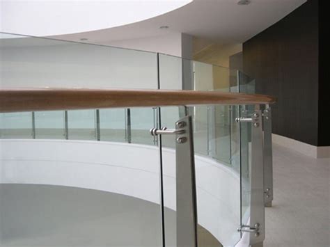 Here you'll find decking posts and handrails to suit a variety of flooring designs. Curved glass balustrade featuring stainless steel profiled ...