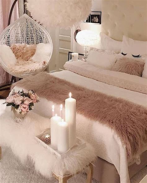 A delicate bed frame plus a mirror and some floral arrangements result in a feminine décor. Pin by شهد حميد on Home decor | Feminine bedroom, Feminine ...