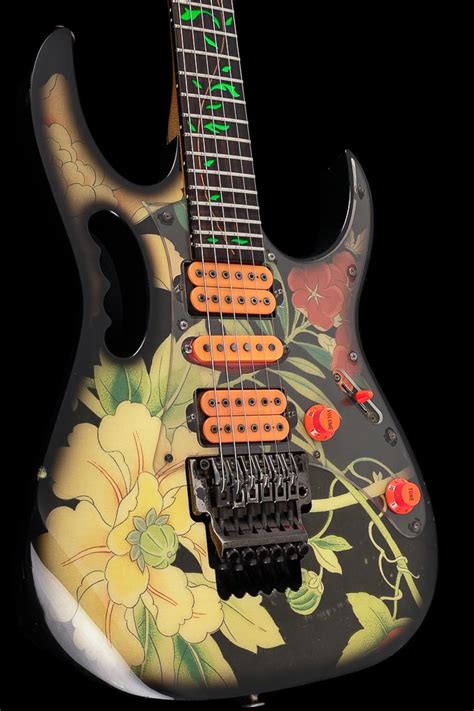 Maybe you would like to learn more about one of these? 1989 Ibanez JEM 77 Floral Pattern - Bigfoot-Guitars