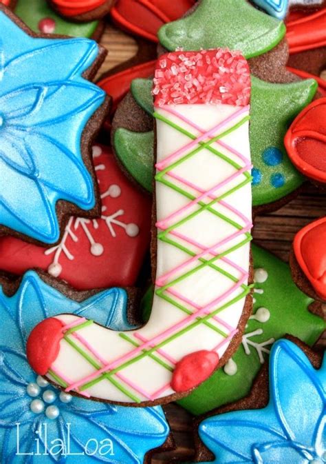 For those who like to play with their food, we've got you covered. Decorated Christmas Stocking Cookies from a candy cane ...