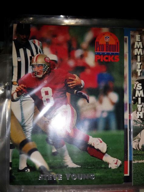 Pic #2 is the back, steve young in a 49er's uniform. Steve young football card | Football cards, Baseball cards, Vintage baseball