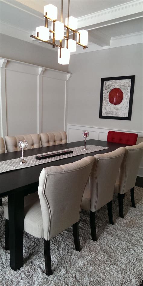 Put the finishing touches on your dining room. Transitional Neutral Dining Room With Red Accent Chair | HGTV
