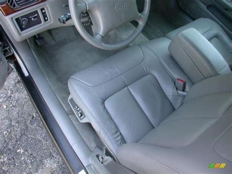 After switching from the rwd to fwd in 1994, cadillac renewed its deville model in 1999 as a 2000 model. Pewter Interior 1999 Cadillac DeVille Sedan Photo ...