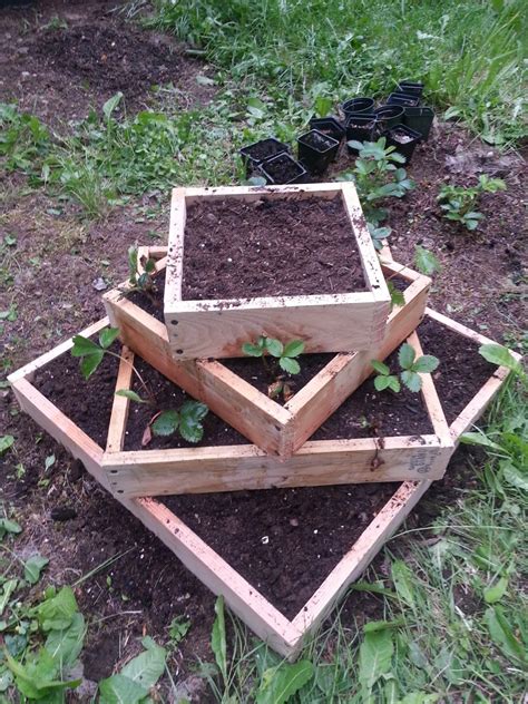 This step by step diy woodworking project is about how to build a strawberry tower. A Rainy Day Designs: This is How My Garden Grows (May 2013 ...