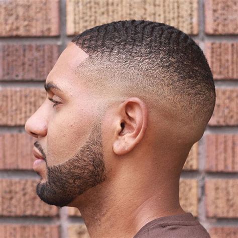 Bald fade with waves and descending cheek line, medium beard. Best Waves Haircuts (2020 Guide)