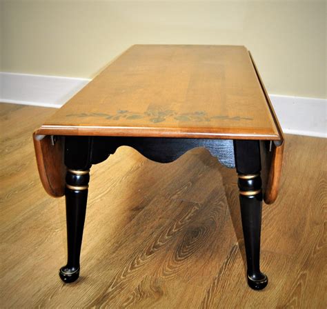 Sides flip up and down on hinges. Vintage Ethan Allen Coffee Table • Display Cabinet