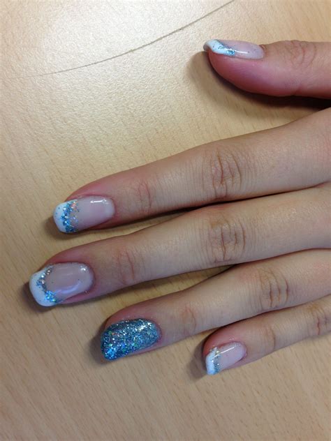 Today i finally made an appointment to get a pedicure. Julianes Nails :) white tip with Blue glitter ;) ; pretty ...