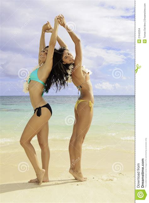 Get your sports bras and nikes ready, because it's time to get your blood. Two Girls Doing Yoga At The Beach Stock Photo - Image of ...