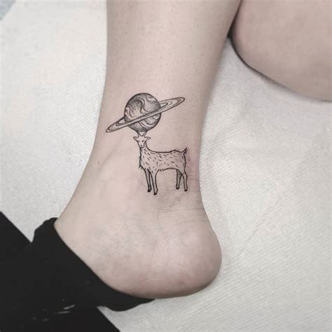 Also shop for tattoo and body art at best prices on aliexpress! Tiny goat stuck in Saturn. Saturn is ruling planet of capricorn and Capricorn is a type of goat ...