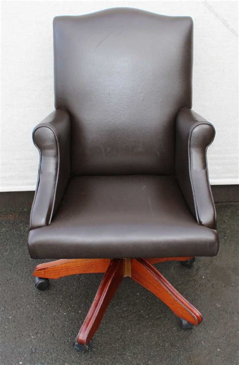 Eams office chair brown real leather walnut swivel up and down tilt in stock. Antiques Atlas - 1960S -Brown Leather Swivel Office Chair