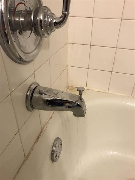 Many people attempt to turn the faucet handles tighter and inadvertently shred the seals even further. plumbing - Bathtub faucet leaking - Home Improvement Stack ...