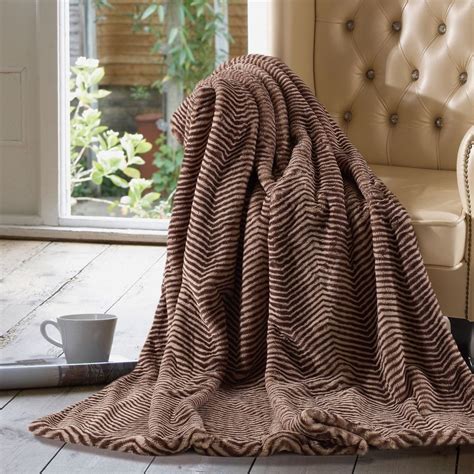 These warm, fuzzy blankets will beautifully wrap around you and help you overcome the wintter. Oversized Luxury Throw 60" x 70" Owl | Faux fur throw ...