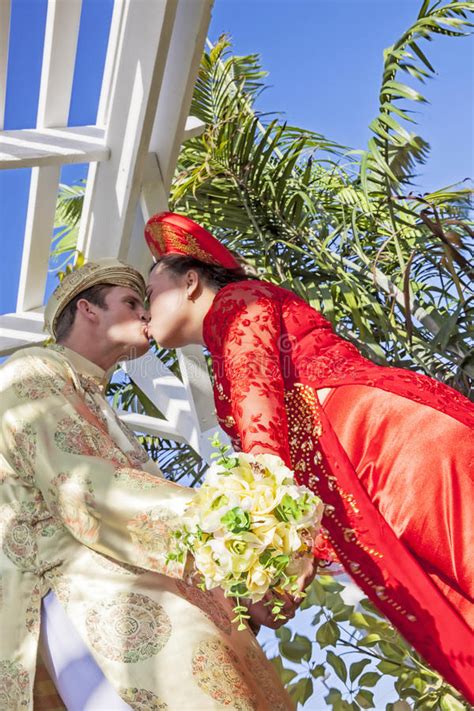 13 ways british wedding traditions and american weddings are different. Vietnamese American Wedding Couple Kiss Stock Photo ...