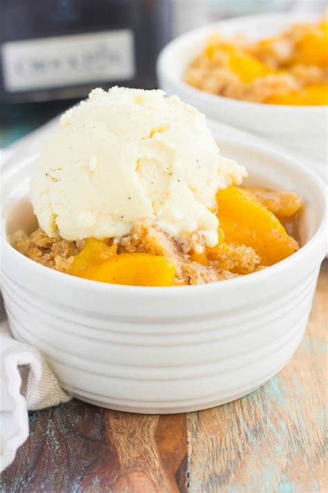 Peach cobbler is a summer favorite — and so easy! Slow Cooker Peach Cobbler | FaveSouthernRecipes.com