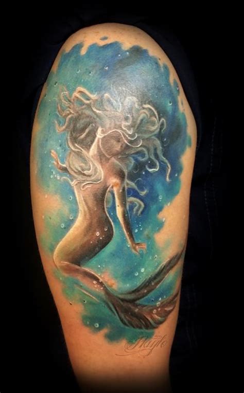 The other type of watercolor tattoo is the one that has a black base. Watercolor style mermaid half sleeve by Haylo : Tattoos